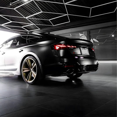 A matte black vinyl wrap on Audi RS6