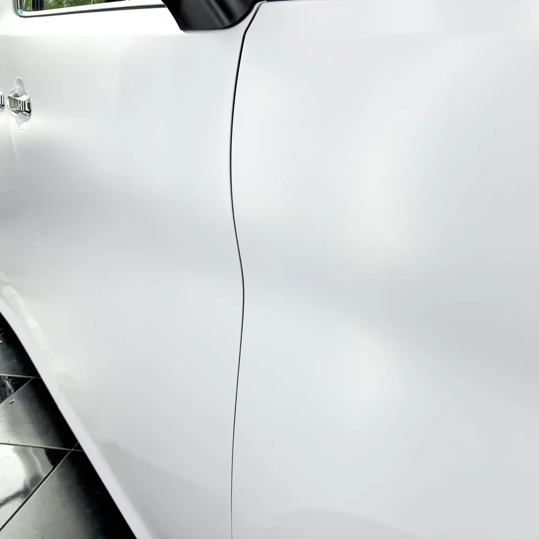 Close-up of Matte White Vinyl Wrap on Toyota body