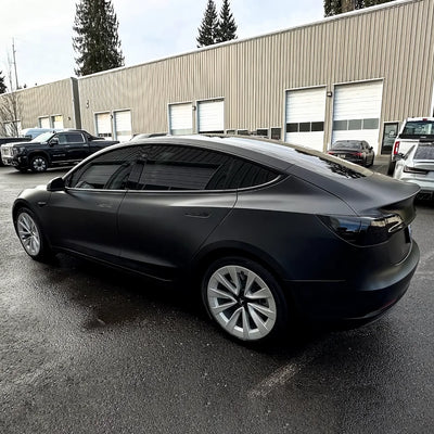 Super Satin Raven Black car wrap on Tesla