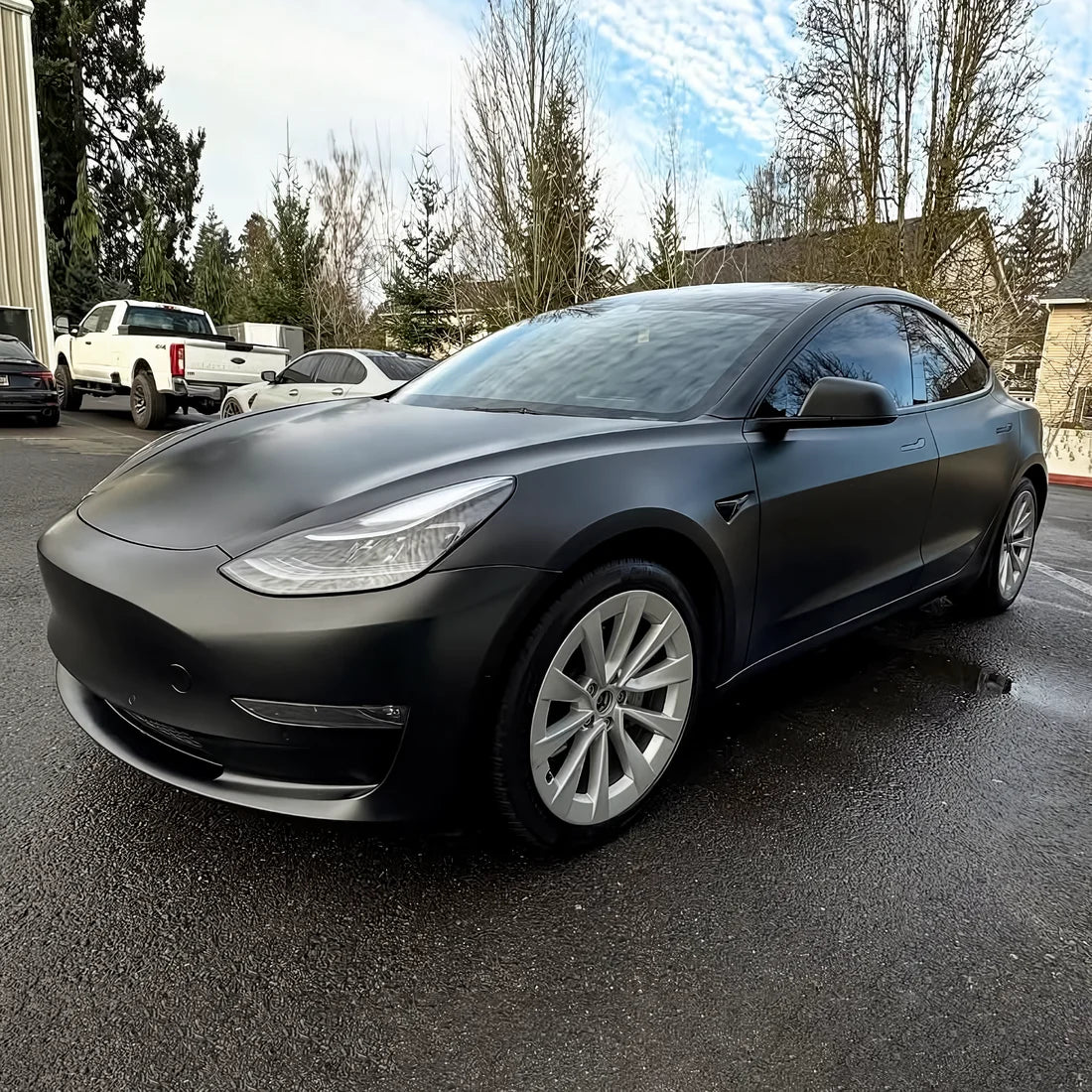 Super Satin Raven Black Vinyl Wrap on Tesla