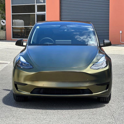 Front view of Tesla Model Y wrapped in Greenfinch Gold satin metallic