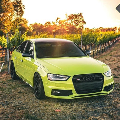 Green car wrap on super car