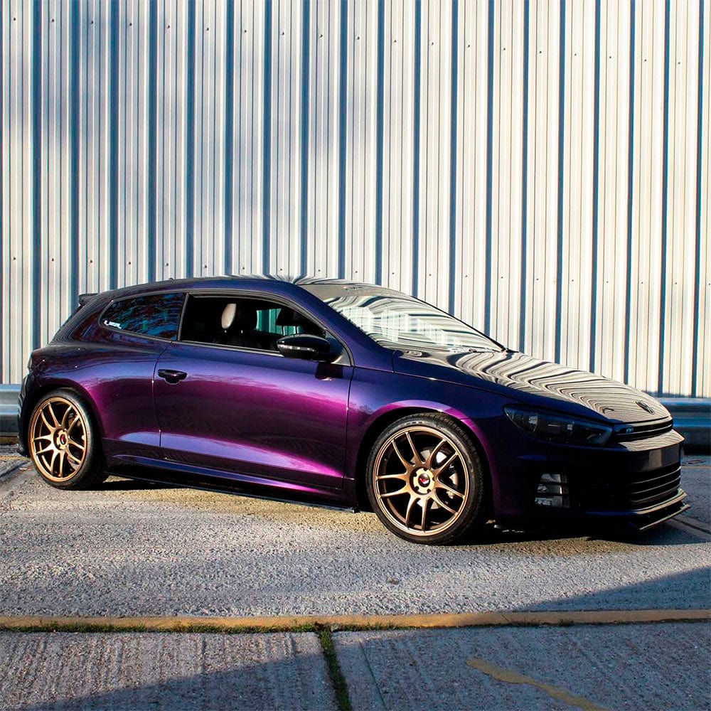 Sporty coupe featuring Gloss Black Cherry Ice Vinyl