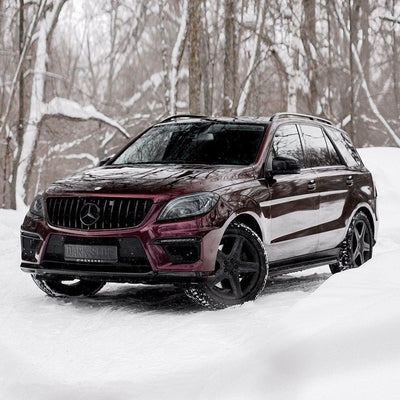 Mercedes SUV wrapped with TeckWrap Gloss Burgundy Black, displaying an elegant