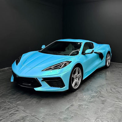 bright light-blue Chevrolet Corvette Stingray (C8) sports car