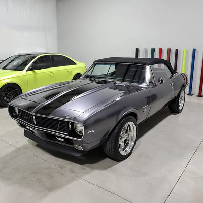 Classic Chevrolet Camaro showcasing a premium Dark Platinum (RB12-HD) Gloss Vinyl Wrap with deep metallic gloss, by TeckWrap.