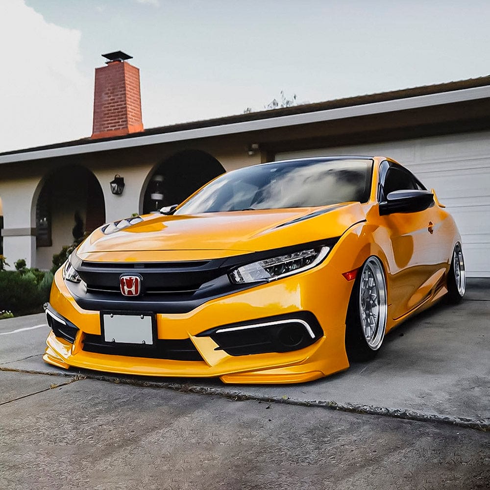 Customized Honda Civic with a sleek, low stance featuring TeckWrap's vibrant Golden Yellow (RB25-HD) gloss vinyl wrap.