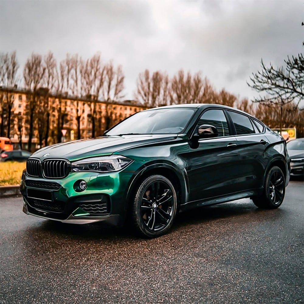 BMW SUV wrapped in Hunter Green gloss vinyl