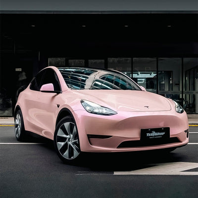 Tesla Model Y wrapped in Maize Pink Gloss Vinyl