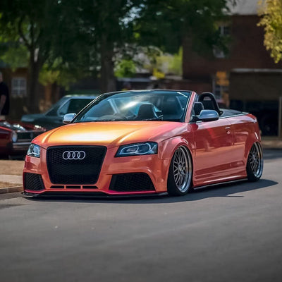 Audi convertible featuring TeckWrap Coral Peach RB08-HD gloss metallic car wrap