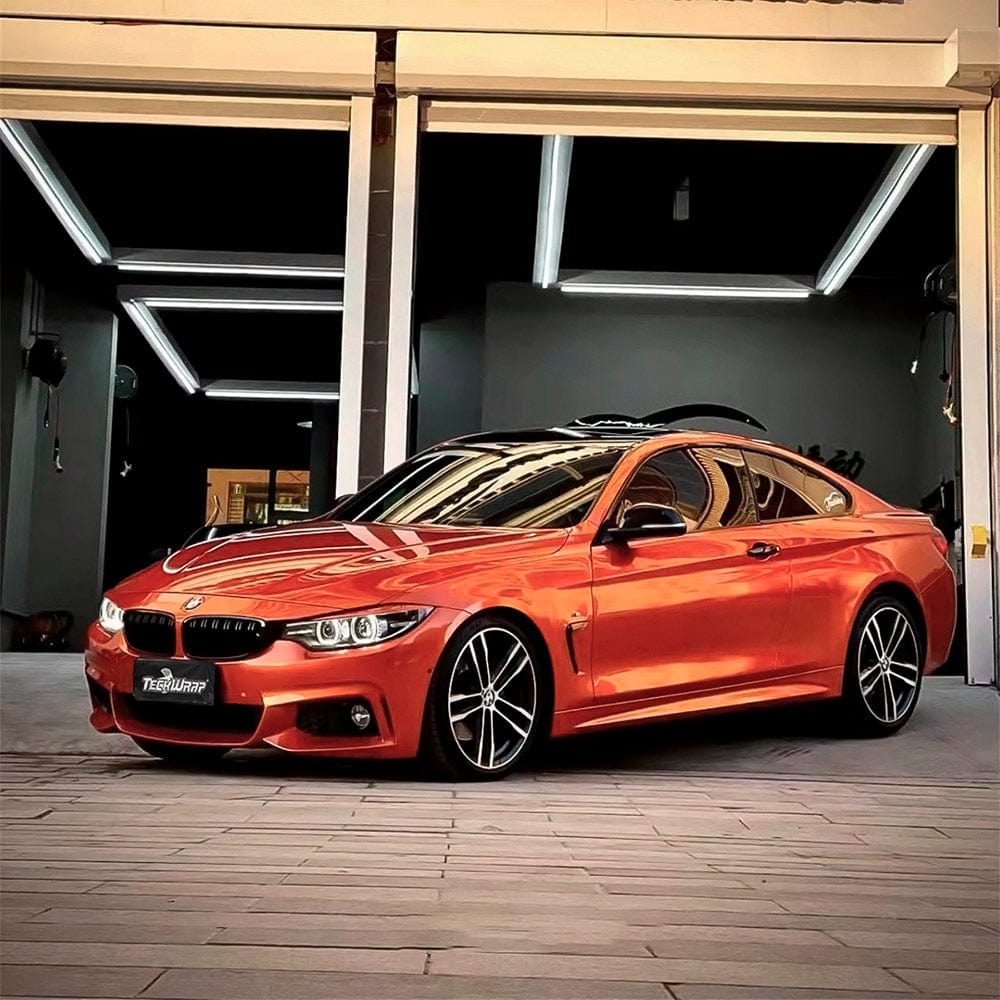 Luxury coupe wrapped with Glossy Paprika Orange Vinyl