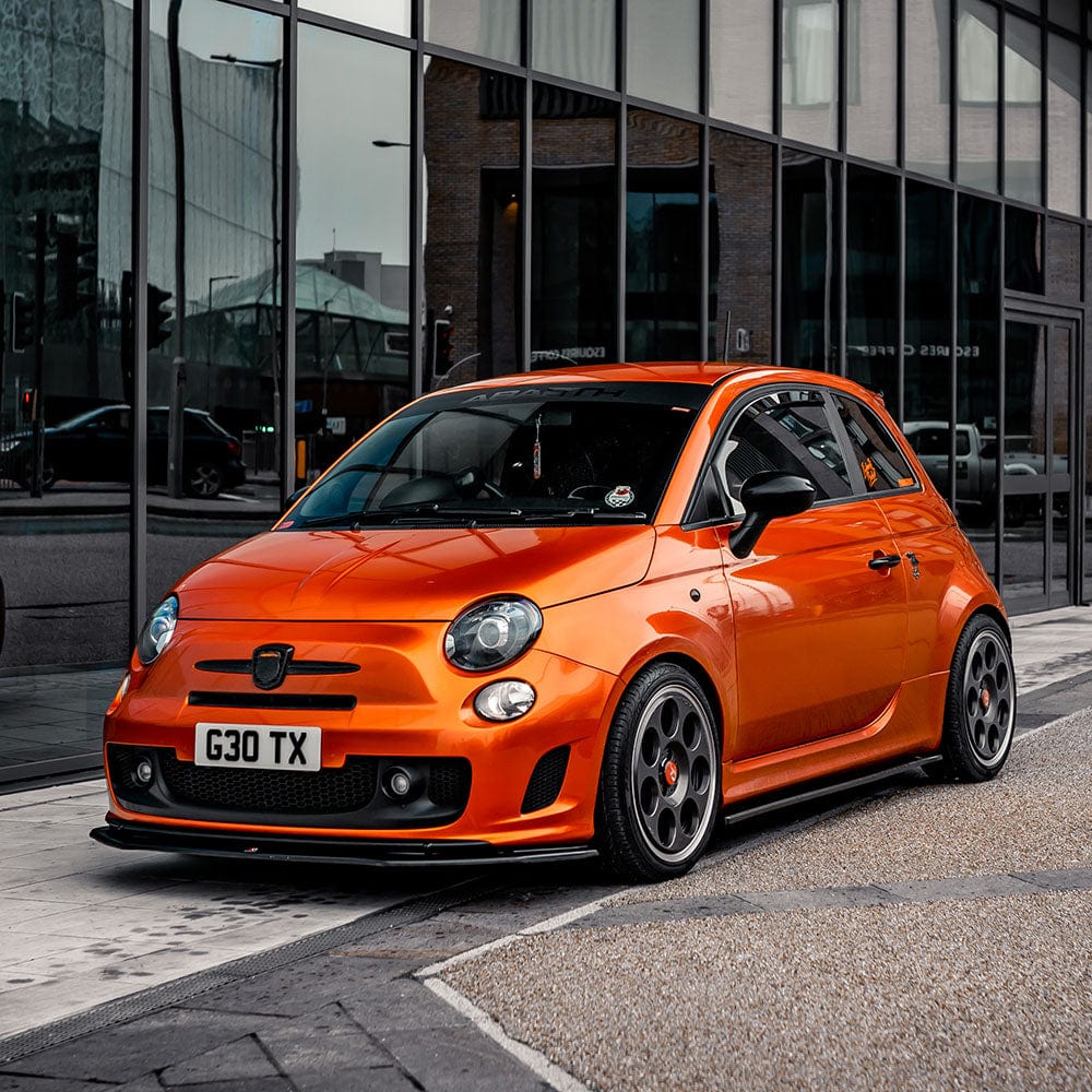 Compact car wrapped in Glossy Paprika Orange Vinyl