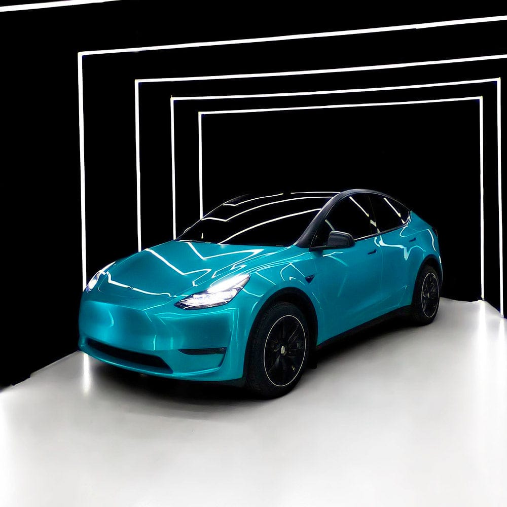 Tesla Model Y Wrapped in Sea Turquoise Gloss Vinyl