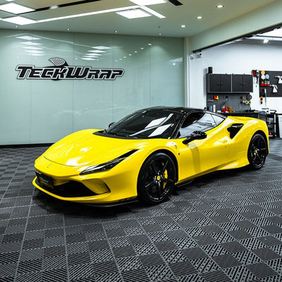 Sleek Ferrari wrapped in vibrant Sunray Yellow