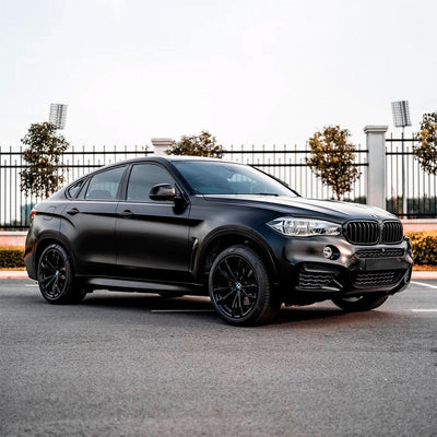BMW SUV wrapped with Sable Black Matte Vinyl Wrap