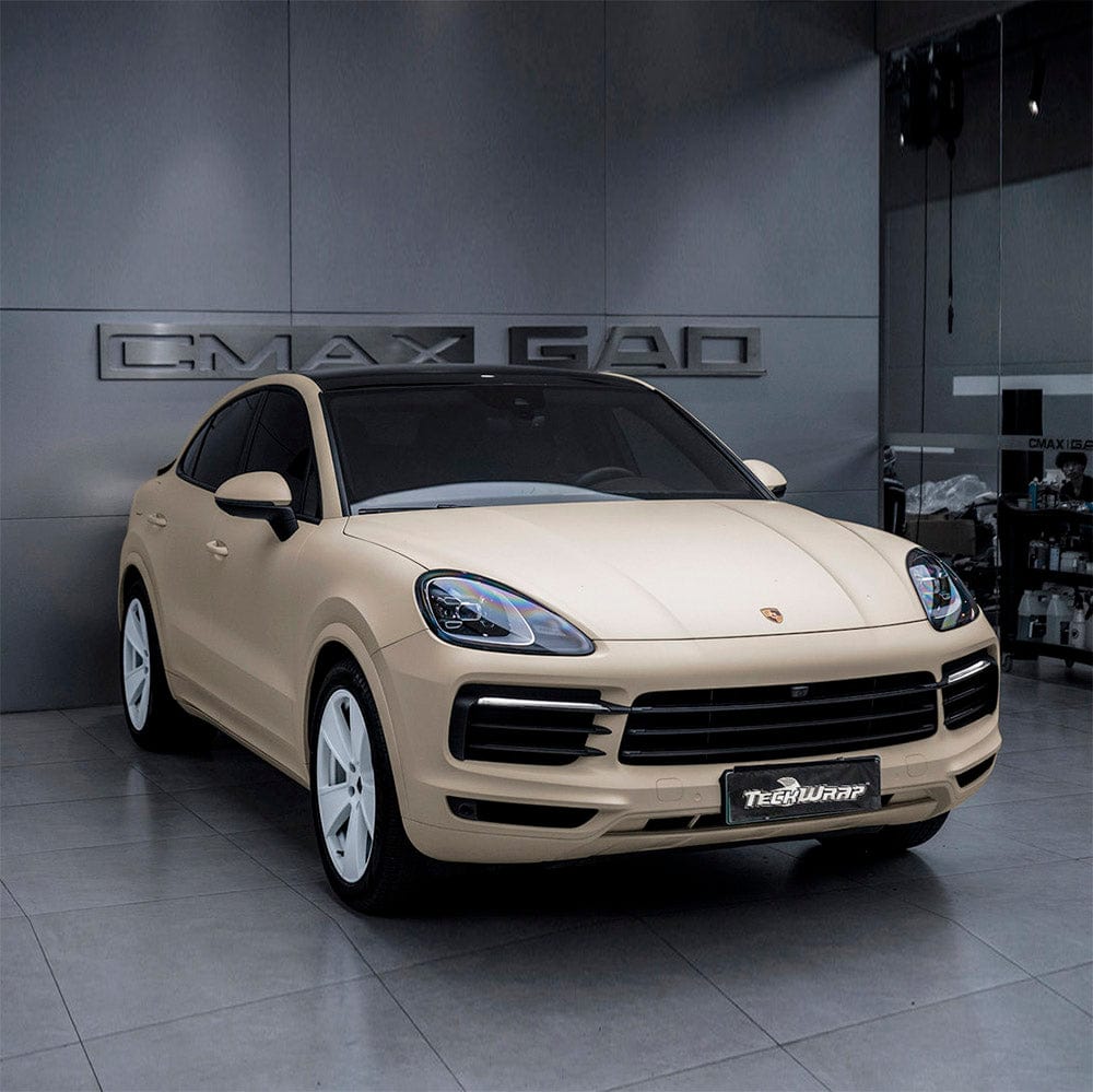 Porsche SUV wrapped in Vanilla Cream Matte Vinyl