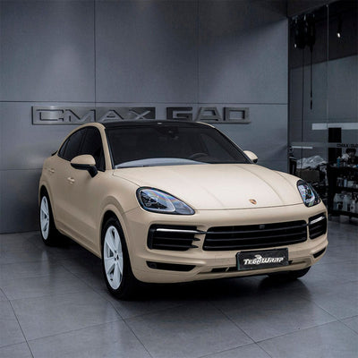 Porsche SUV wrapped in Vanilla Cream Matte Vinyl