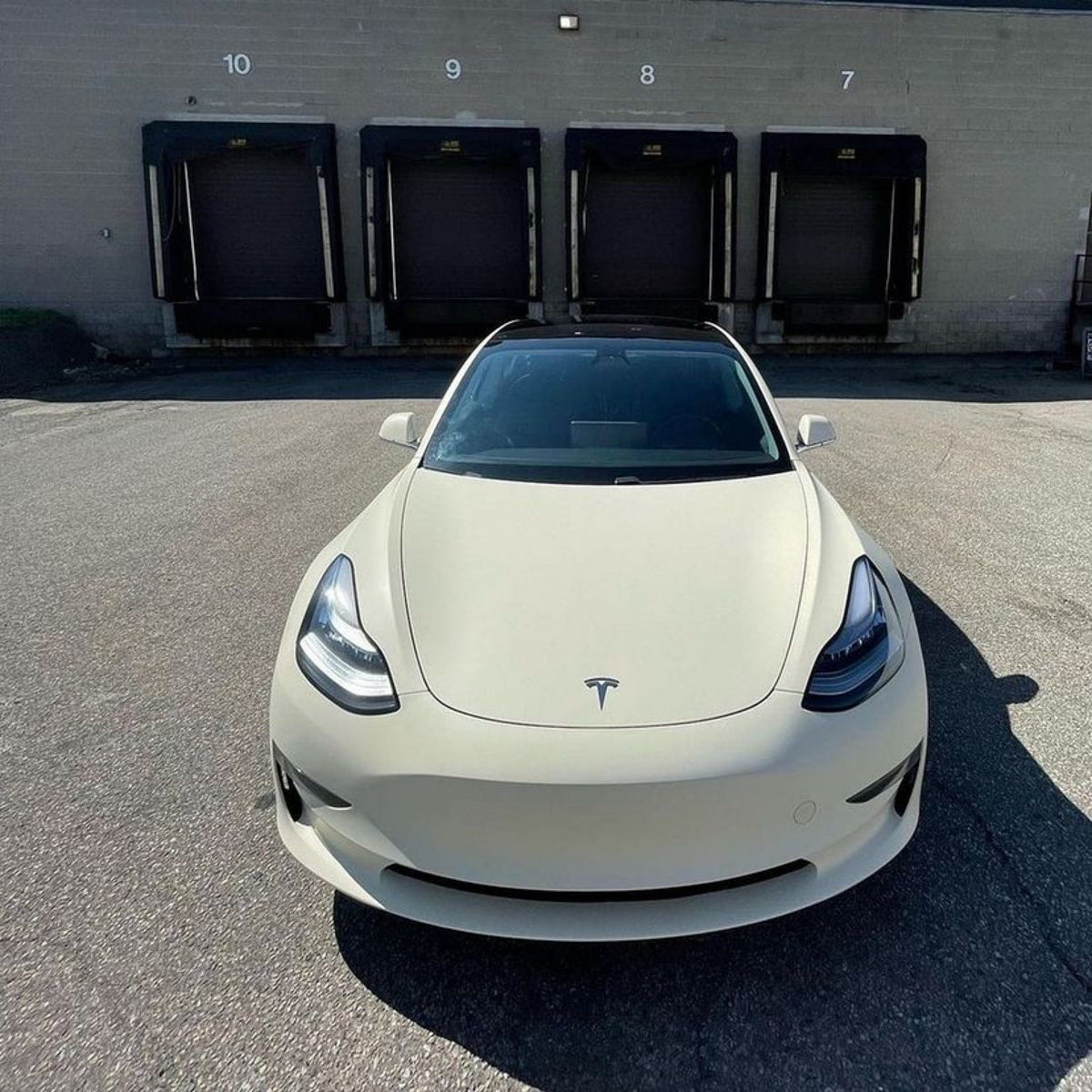 Tesla Model 3 showcasing Vanilla Cream Matte Vinyl Wrap