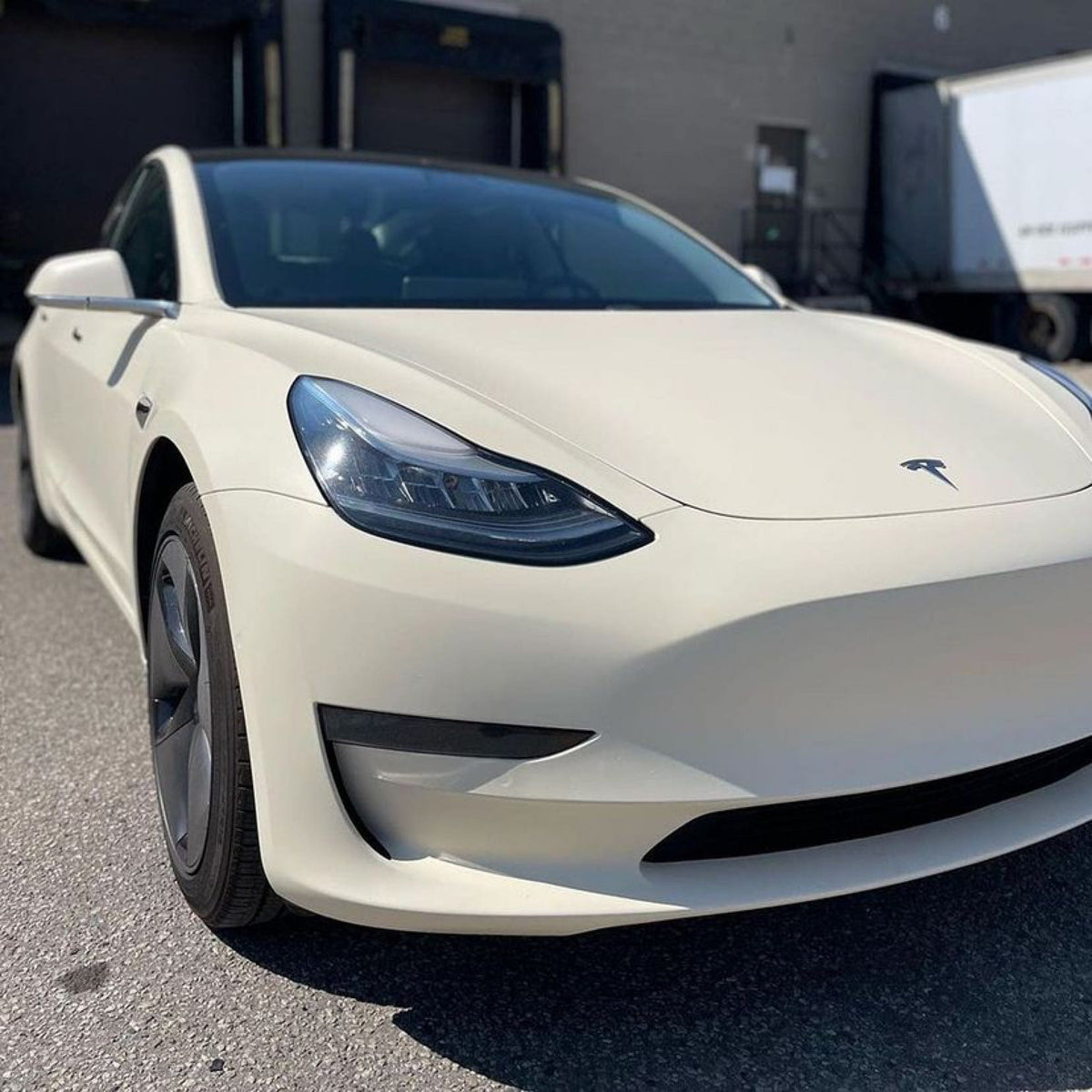 Tesla Model 3's hood wrapped in Vanilla Cream Matte Vinyl