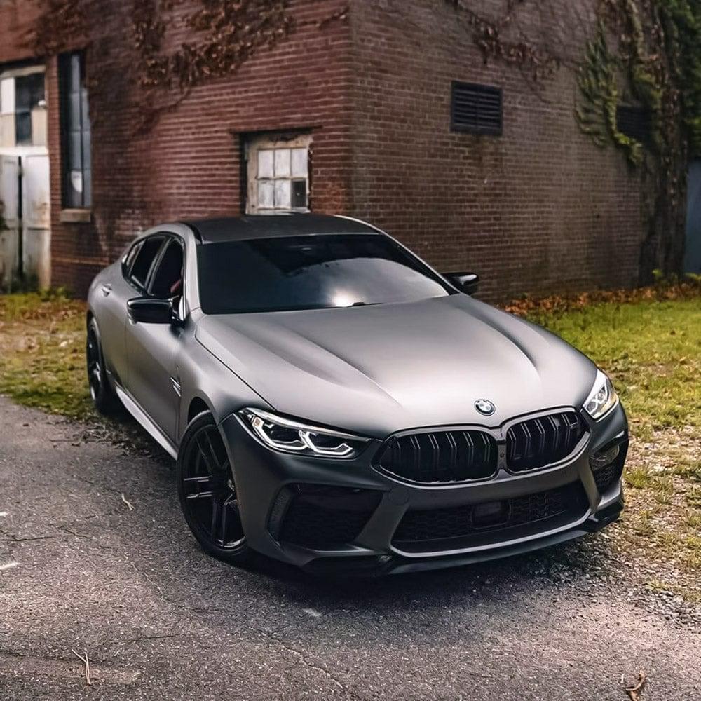 a BMW wrapped in TeckWrap Satin Black Silver  Vinyl Wrap