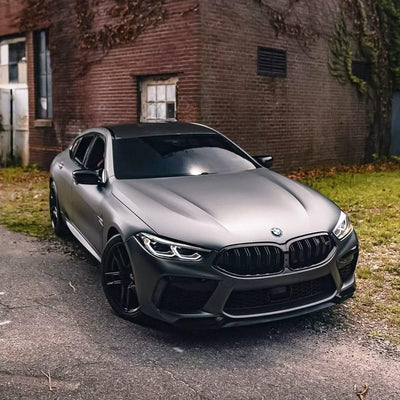 a BMW wrapped in TeckWrap Satin Black Silver  Vinyl Wrap