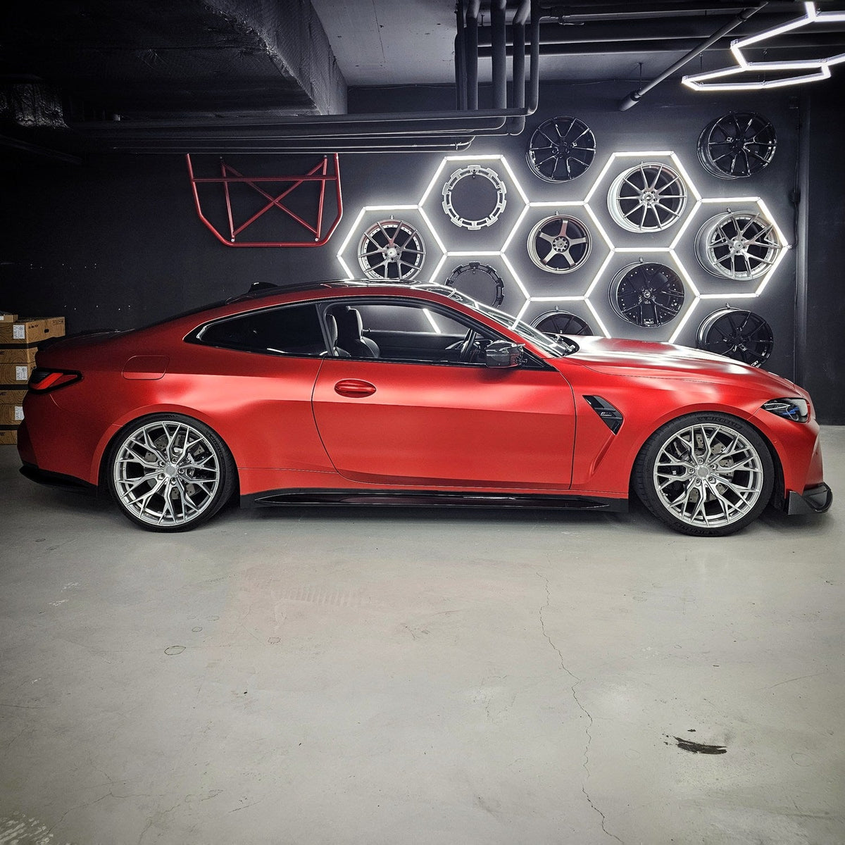 Satin Crimson Red Vinyl Wrap Side profile of a BMW