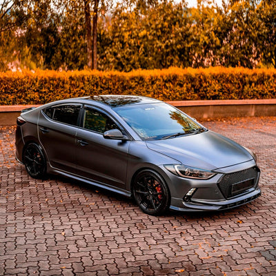 Sedan fully wrapped in Dark Platinum Satin Vinyl Wrap