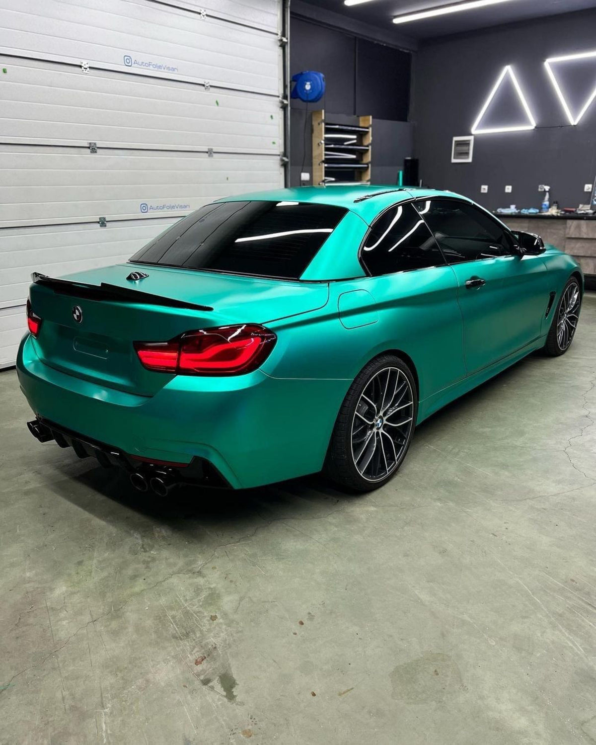 BMW wrapped in  Emerald Green Satin Vinyl