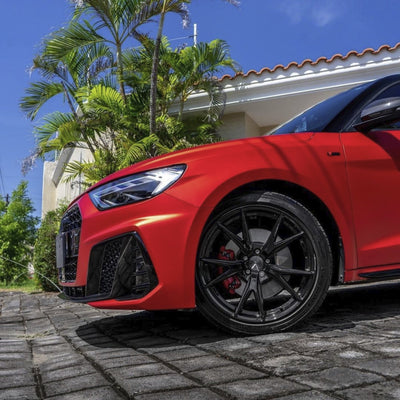 Front wheel wrapped in Flame Red satin vinyl wrap