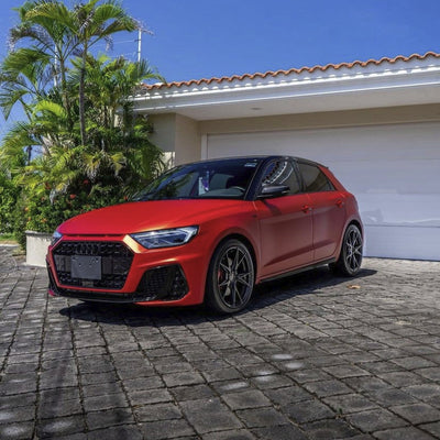 Audi hatchback wrapped in Flame Red satin red vinyl