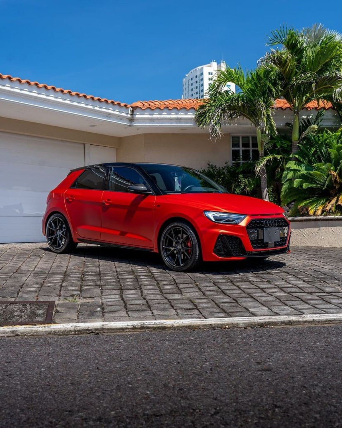 hatchback fully wrapped in Flame Red satin vinyl