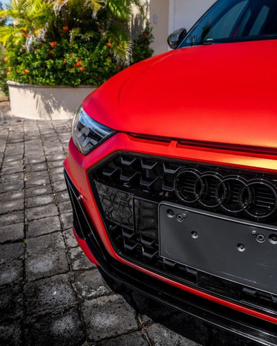Glossy black grille front