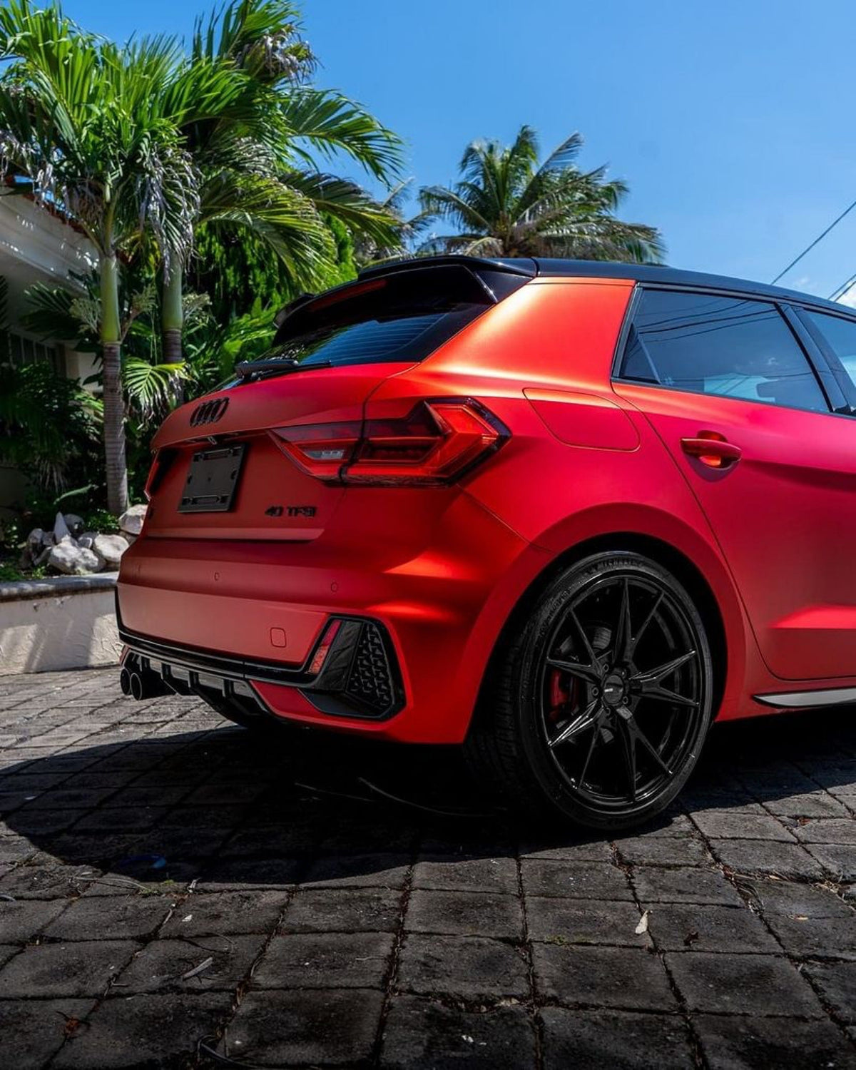 Audi hatchback in Flame Red satin vinyl wrap