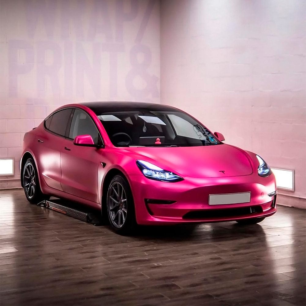Tesla Model 3 wrapped in Hot Pink Satin Vinyl Wrap