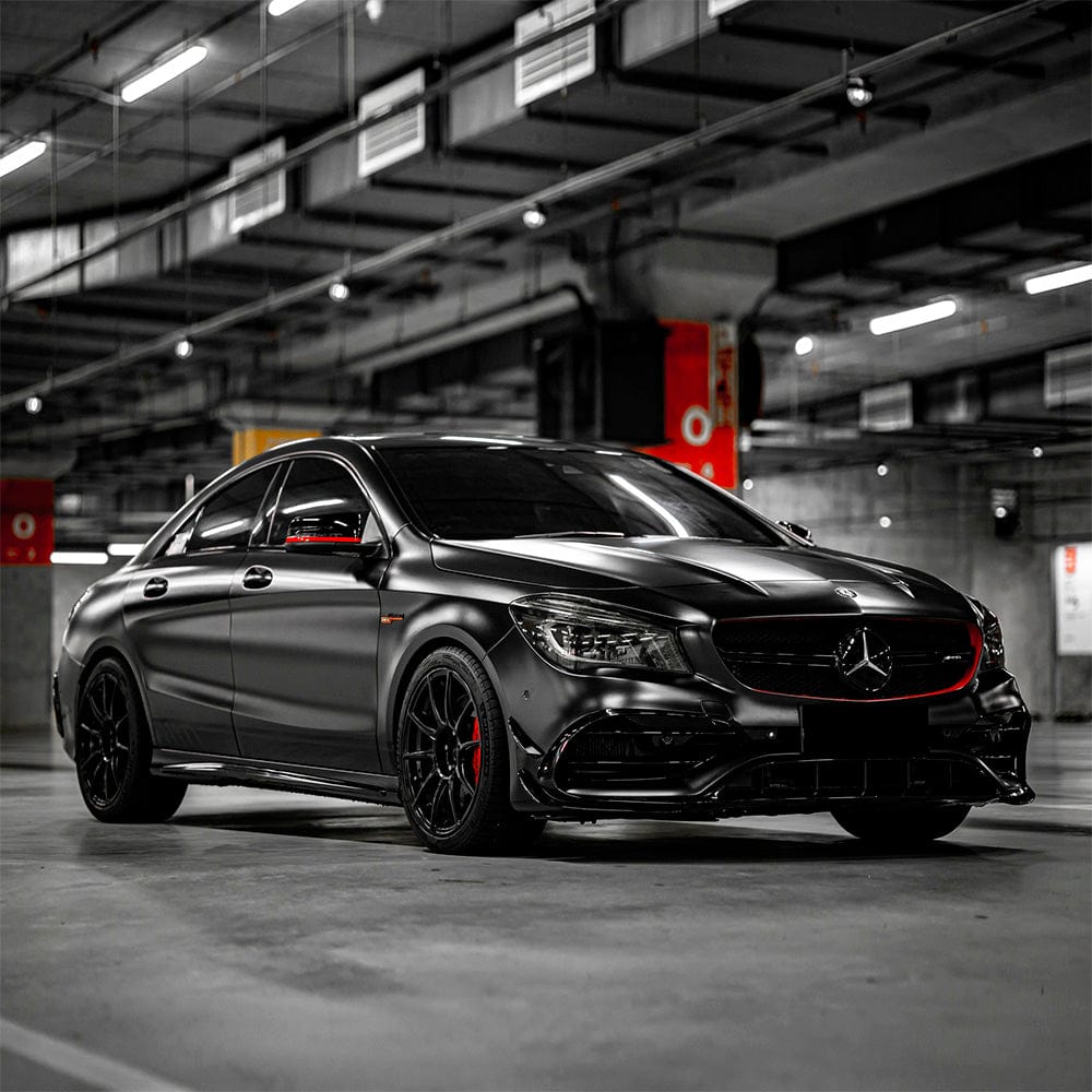 sedan wrapped in Matte Coal Black Satin Vinyl Wrap