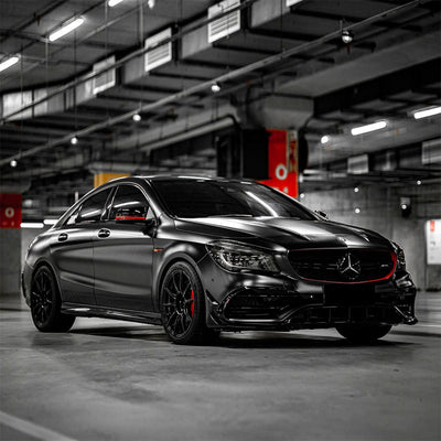 sedan wrapped in Matte Coal Black Satin Vinyl Wrap