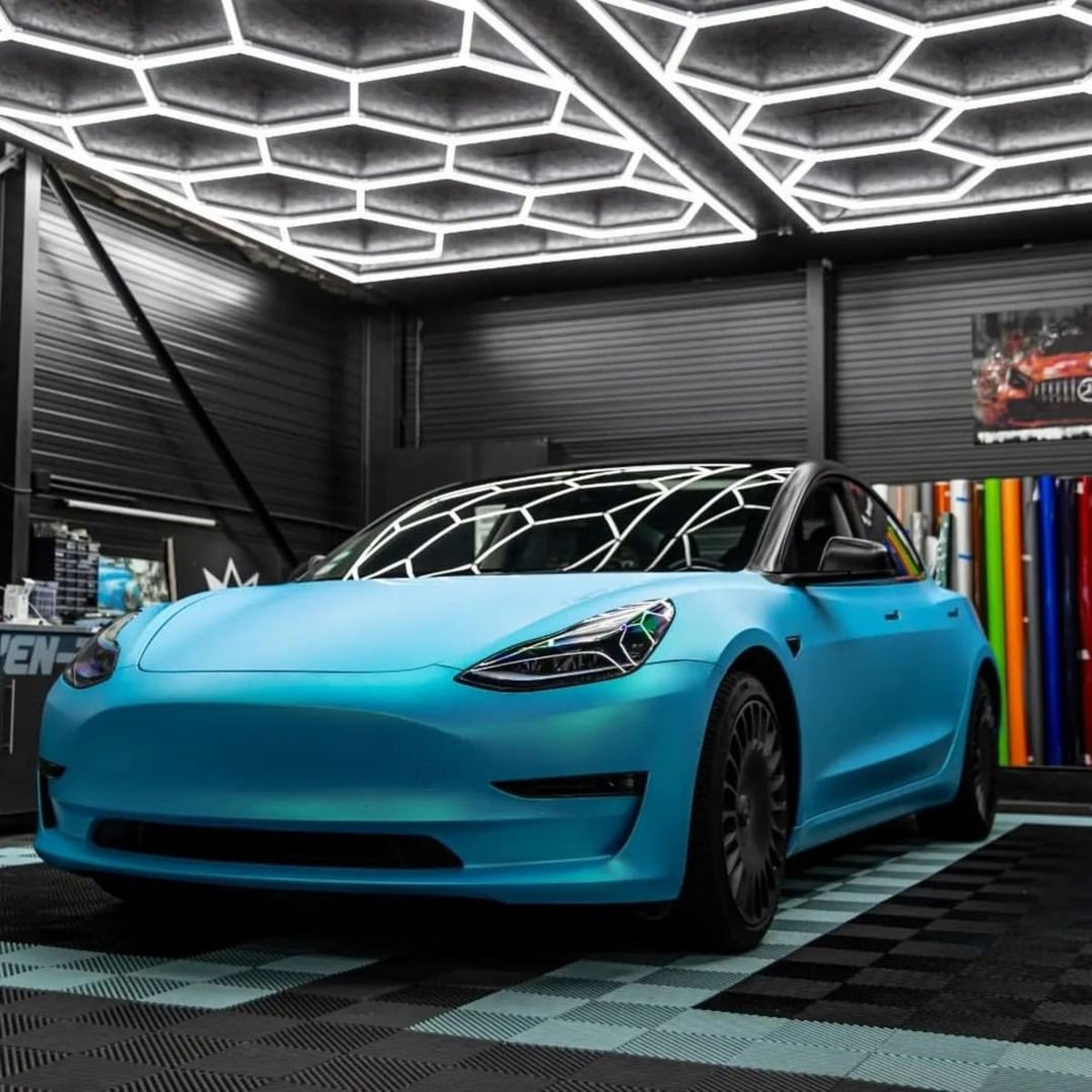 Tesla Model 3 Wrapped in Surf Blue Satin Vinyl Wrap