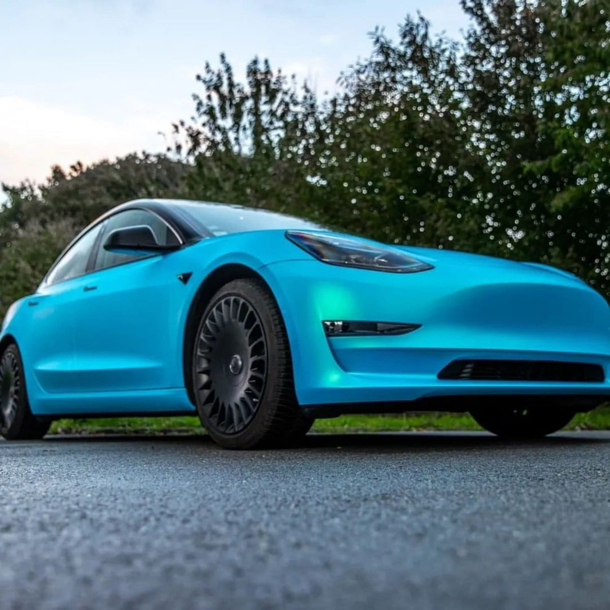 Tesla Model 3 Featuring Surf Blue Satin Vinyl Wrap