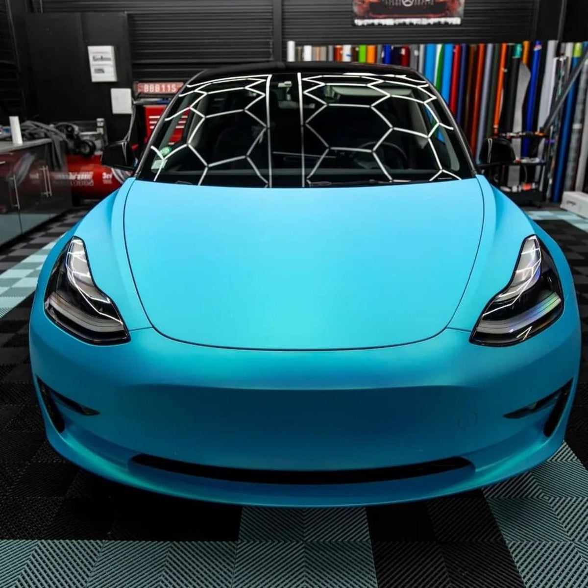Tesla Model 3 Wrapped with Surf Blue Satin Vinyl