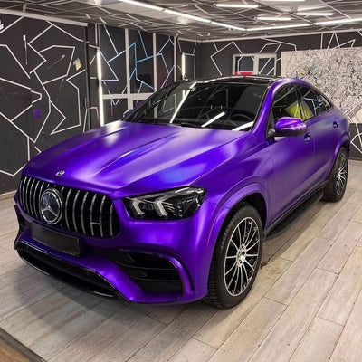 Mercedes-Benz SUV enhanced with TeckWrap's Violet Purple (VCH416-S) Satin Vinyl Wrap, emphasizing its bold purple color and sophisticated satin sheen.