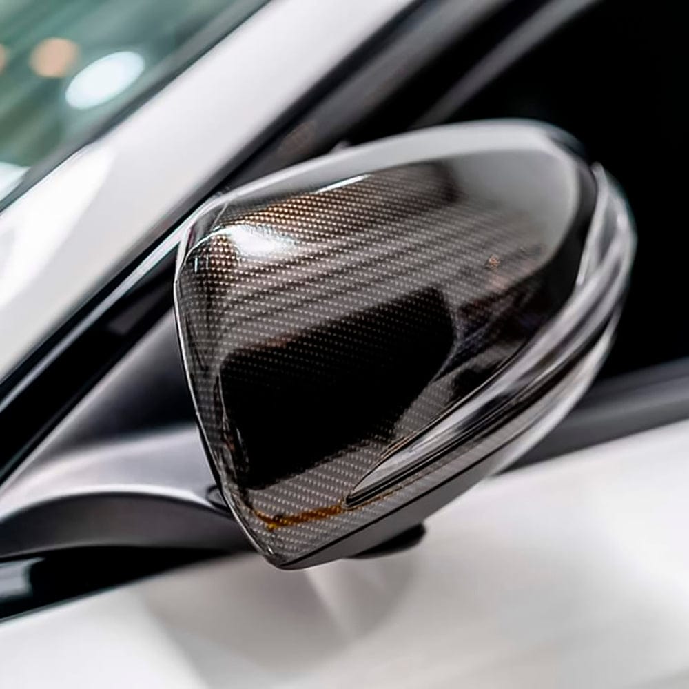 Car side mirror wrapped in Ceramic Carbon vinyl