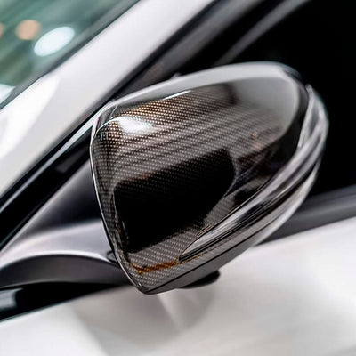 Car side mirror wrapped in Ceramic Carbon vinyl